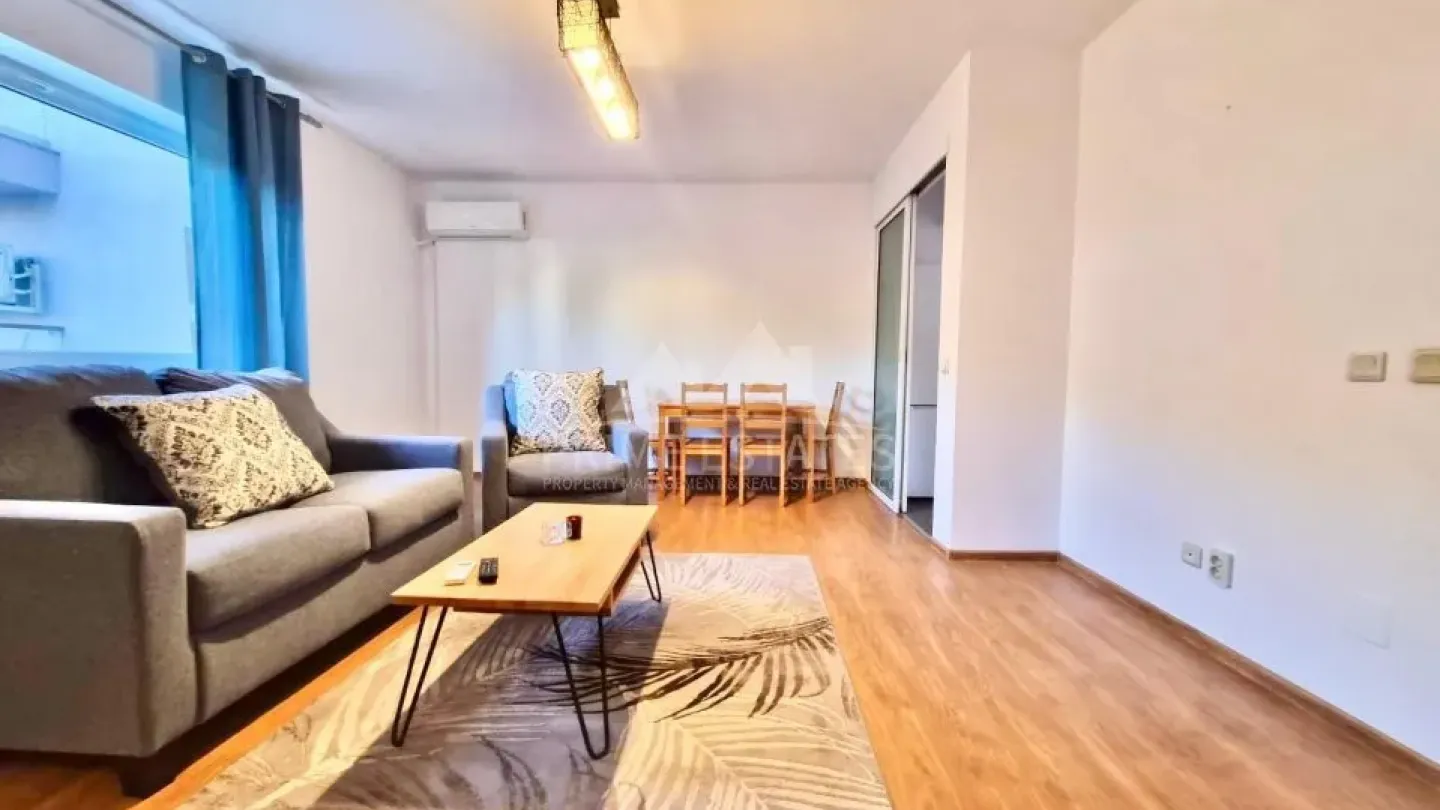 Greenfield Residence: Fully Furnished 2-Bedroom Apartment with Parking - Image 1