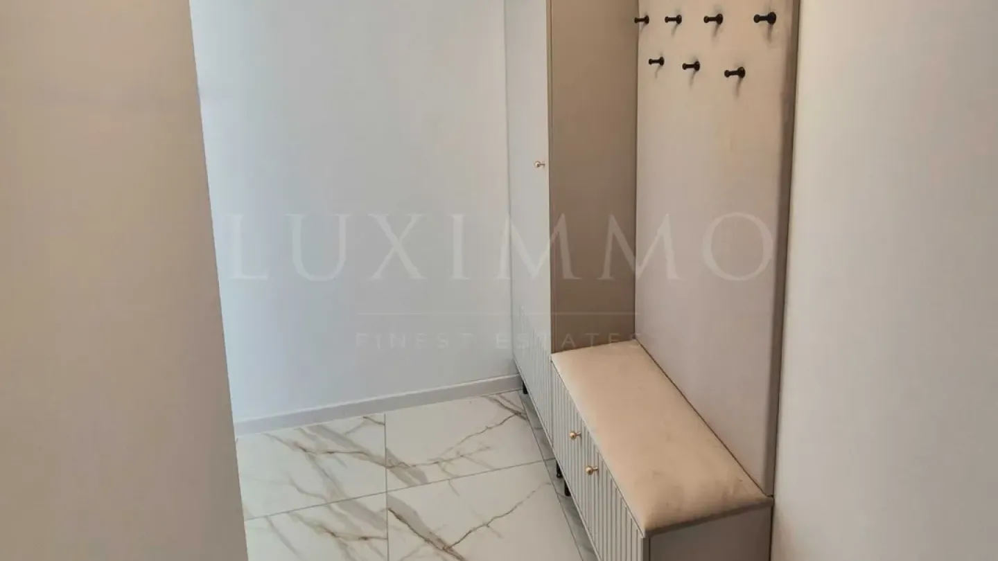 Stylish One-Bedroom Apartment with Private Landscaped Yard in Pchelina - Image 2