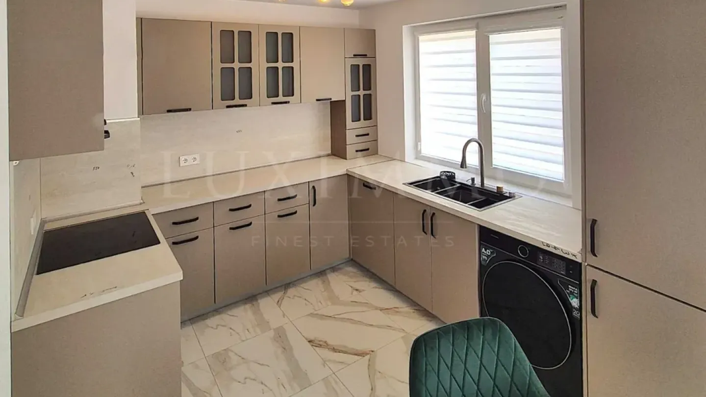Stylish One-Bedroom Apartment with Private Landscaped Yard in Pchelina - Image 5