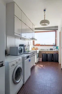 Spacious Corner Apartment with Terraces and Garage in Ukkel, Belgium - Image 3