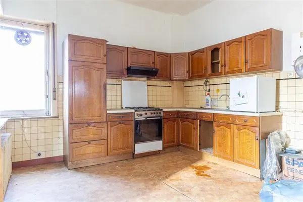 Spacious Royal Uccle Home: Renovation Opportunity with High Potential - Image 1