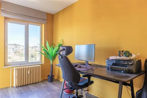 Bright 3-Bedroom Penthouse with Terraces & Parking in Ukkel - Image 1