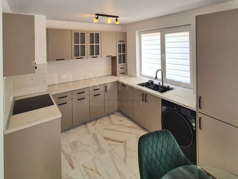 Stylish One-Bedroom Apartment with Private Landscaped Yard in Pchelina - Image 5