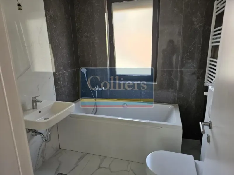 Spacious Four-Bedroom Apartment with Three Terraces and Garage in Vračar - Image 3